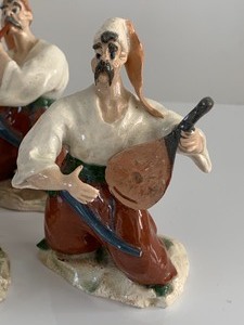 lot 219 image: Small Ceramic Figurines- Festive Cossacks