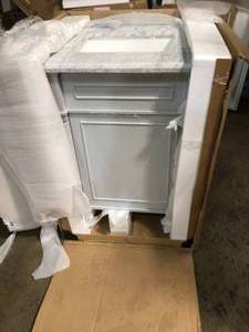 lot 36 image: Home Decorators Collection Aberdeen 24 in. W x 20 in. D Bath Vanity in Dove Grey with Carrara Marble Top with White Sink in good condition see all pictures