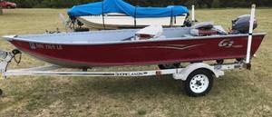 lot 1 image: 2015 G3 by Yamaha Guide V14 w Shorelandr Trailer