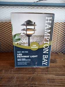 lot 53 image: Low-Voltage Black Outdoor Integrated LED 3-Tier Metal Landscape Path Light with Frosted Plastic Lens by Hampton Bay