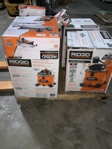 PALLET OF ASSORTED RIGID VACUUMS, TILE SAW, AND FILTERSACCESSORIES. VARIOUS CONDITIONS. SEE PICTURES