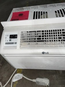 LG ELECTRONICS 6,000 BTU 115-Volt Window Air Conditioner in White. See Pictures