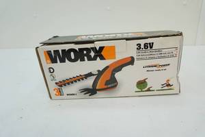 lot 11 image: Cordless shear and shrubber