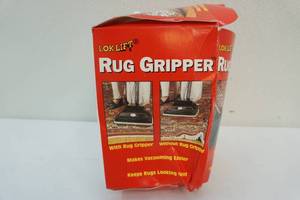 lot 13 image: Assortment of scotch tape, rug grip