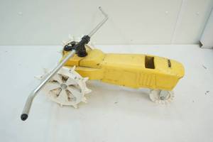 lot 29 image: Iron tractor sprinkler
