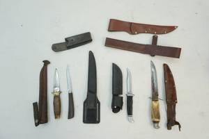 lot 104 image: knifes, sheaths