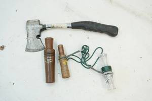 lot 161 image: Hatchet, duck calls