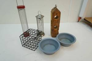 lot 197 image: Bird feeders, bowls
