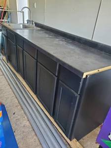 8ft Counter top and cabinet with stainless steel sing and faucet