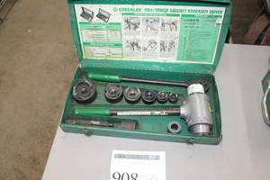 lot 908 image: Greenlee Ratchet Knockout Driver 19041906SB  with Metal Case