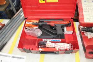 lot 973 image: Hilti Power Actuated Nail Gun DX36M  with Plastic Case, Accessories