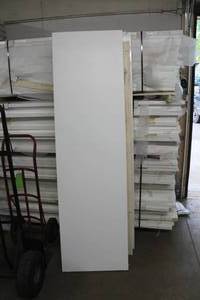 lot 365 image: Lot of (2) Primed Solid Core Wood Doors White 2THx24Wx84H
