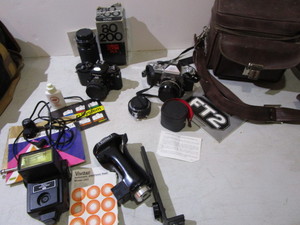 lot 53 image: Nikon Nikkormat 35mm camera with 50...