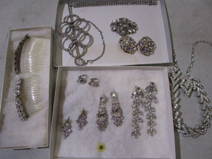 lot 56 image: Rhinestone jewelry earrings, pins,...
