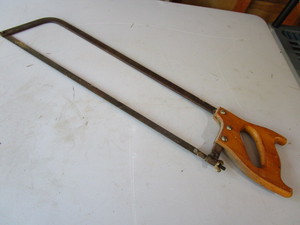 lot 142 image: Meat saw with 21 blade, overall 29...