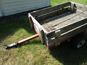 lot 203 image: Lawn trailer, wood frame with 1-78...