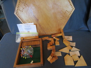 lot 230 image: Dice box, wooden puzzles, marble ga...