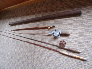 lot 250 image: Vintage fishing rods with steel & b...