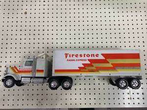 lot 13 image: Vintage Nylint Firestone Radial Express Pressed Steel Semi Truck