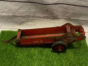 lot 53 image: Antique McCormick Tractor Spreader