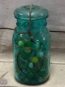 lot 58 image: Antique Marbles in 7 Tall Glass Jar