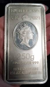 lot 08 image: 2021 ST HELENA 250 GRAM (8.04 TROY OZ) .999 FINE SILVER BAR EAST INDIA COMPANY