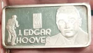 lot 10 image: 1 TROY OZ. .999 FINE SILVER ART BAR J EDGAR HOOVER