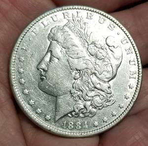 lot 16-A image: 1884 MORGAN SILVER DOLLAR