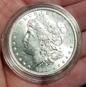 lot 14-A image: 1889 MORGAN SILVER DOLLAR UNC IN AIRTITE HOLDER