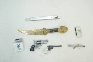 Pistols, sharpening stone, etc