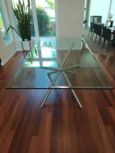 Stunning Modern style glass top dining table
