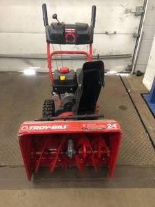 lot 3 image: 24 in. 208 cc Two-Stage Gas Snow Blower with Electric Start Self Propelled by Troy-Bilt- customer return - see pictures