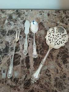 lot 13 image: Four Pieces of Sterling Silver Silverware