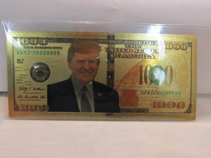 lot 77 image: TRUMP GOLD $1000 BILL