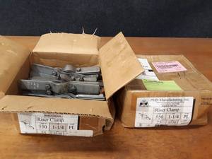 lot 1921 image: Lot of (50) 1-14 IP Riser Pipe Clamps
