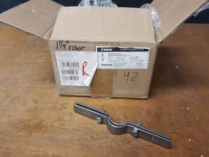 lot 1928 image: Lot of (42) 1-14 IP Riser Pipe Clamps