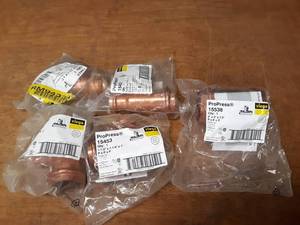 lot 2052 image: VIEGA ProPress Copper Fittings - (4) 1-12 x 1-14 x 1 Tees & (1) 2 x 2 x 12 Tee