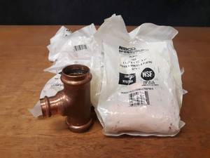 lot 2058 image: NIBCO PressSystem Copper Fittings - (9) 1-12 x 1-12 x 1 Reducing Tees
