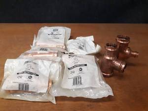 lot 2071 image: NIBCO PressSystem Copper Fittings - (4) 2 x  1-12 x 34, (1) 2 x 2 x 12, (1) 2 x 1-12 x 1-12, (1) 2 x 2 x 34, (1) 2 x 1-14 x 1-14 Reducing Tees