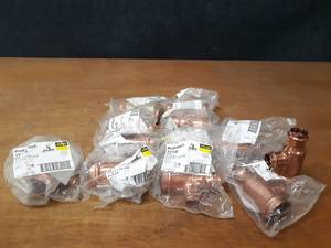 lot 2074 image: VIEGA ProPress Copper Fittings - (8) 1-12 x 1-14 x 34, (3) 1-12 x 1 x 34, (1) 1-12 x 1-12 x 12 Reducing Tees
