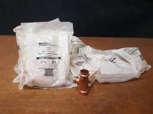 lot 2099 image: NIBCO PressSystem Copper Fittings - (54) 34 x 34 x 12 Reducing Tee