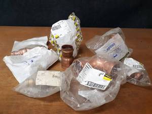 lot 2117 image: NIBCO, Apollo & VIEGA PressSystem Copper Fittings - (3) 2 x 2 x 1 Reducing Tees, (2) 2-12 x 2 Reducing Coupler (FTG x Press), (1) 2-12 90° Elbow, (1) 1-14 x 1 x 1 Tee, (1) 2-12 x 2 Reducer Coupling