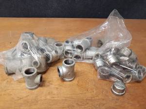 lot 2118 image: Lot of (46) Steel Pipe Fittings - (8) 1 Tees, (16) 1 x 1 x 12 Reducing Tees, (22) 1 Caps