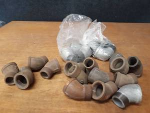 lot 2121 image: Lot of (21) Steel Pipe Fittings - 1-12 45° Street Elbows