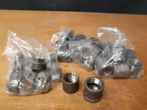 lot 2123 image: Lot of (35) Steel Pipe Fittings - (15) 1-12 Plugs, (20) 1-12 Couplers