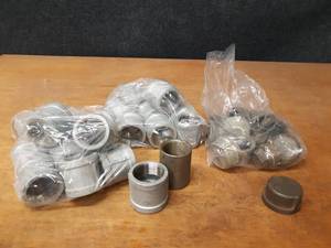 lot 2124 image: Lot of (41) Steel Pipe Fittings - (12) 1-12 Caps, (2) 1-12 Plugs, (27) 1-12 Couplers