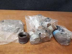 lot 2125 image: Lot of (23) Steel Pipe Fittings - (8) 2 Caps, (7) 2 45° Street Elbows, (6) 2 Couplers, (2) 2 90° Street Elbows