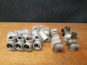 lot 2135 image: Lot of (26) Steel Pipe Fittings - (6) 1-12 90° Elbows, (15) 1-12 Tees (2) 1-12 x 1 90° Elbows and More