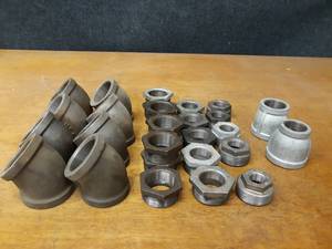 lot 2140 image: Lot of (29) Steel Pipe Fittings - (8) 2 45° Elbows, (9) 2 x 1-12 Bushings, (5) 2 x 1-14 Bushings, (4) 2 x 1 Bushings, (1) 2 x 34 Bushings, (2) 2 Reducers