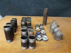lot 2145 image: Lot of (35) Steel Pipe Fittings - (12) 2 Plugs, (5) 2 45° Elbows, (6) 2 x 5-12 Nipples, (4) 2 x 4-12 Nipples, (2) 2 x 4 Nipples, (3) 2 x 5 Nipples, (2) 2 x 6 Nipples & (1) 2 x 10 Nipple